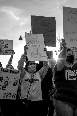 Protester holding sign