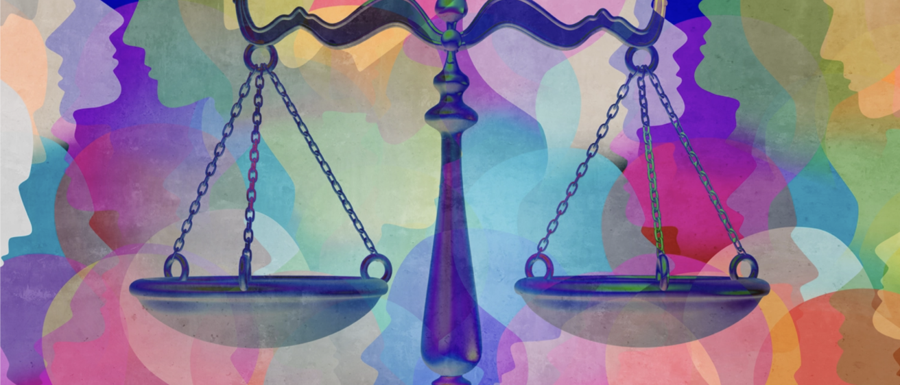 Scales of justice with multicolored face background